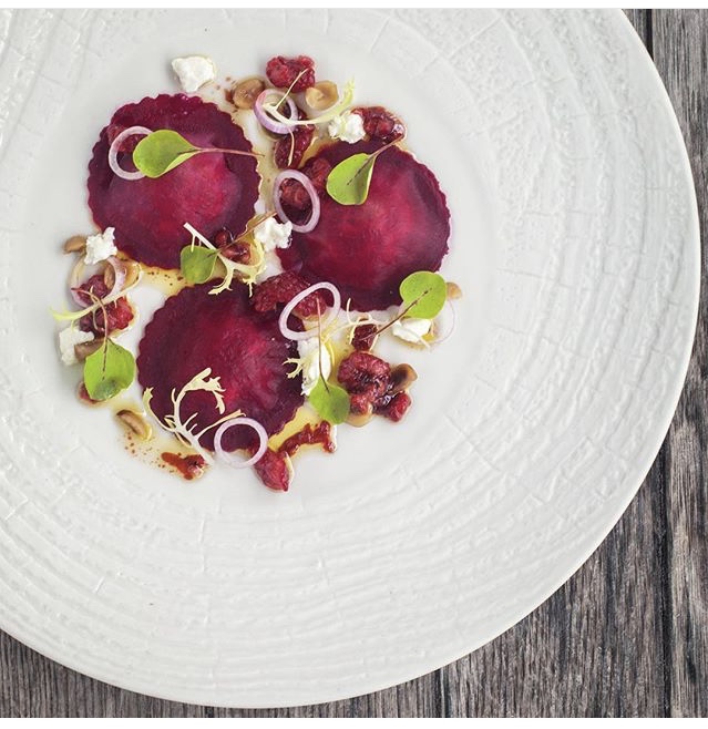 Beet ravioli, goat cheese pickled shallots